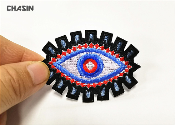 Китай Заплаты Апплике дизайна логотипа глаза ОЭМ изготовленные на заказ на одеяние 4.5км высокорослое завод